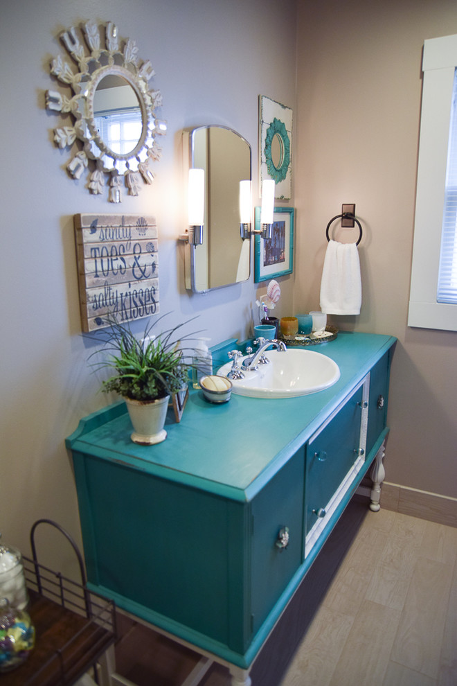 Design ideas for a small shabby-chic style bathroom in Seattle with freestanding cabinets.