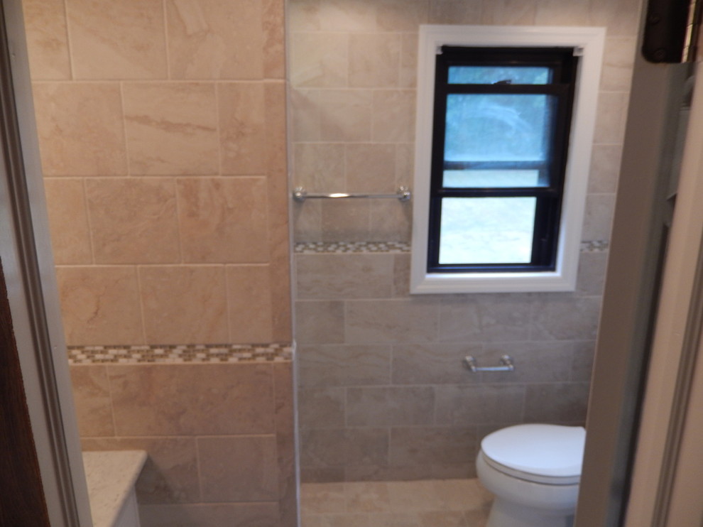Example of a small 3/4 beige tile and ceramic tile ceramic tile alcove shower design in New York with an undermount sink, flat-panel cabinets, white cabinets, granite countertops, a two-piece toilet and beige walls