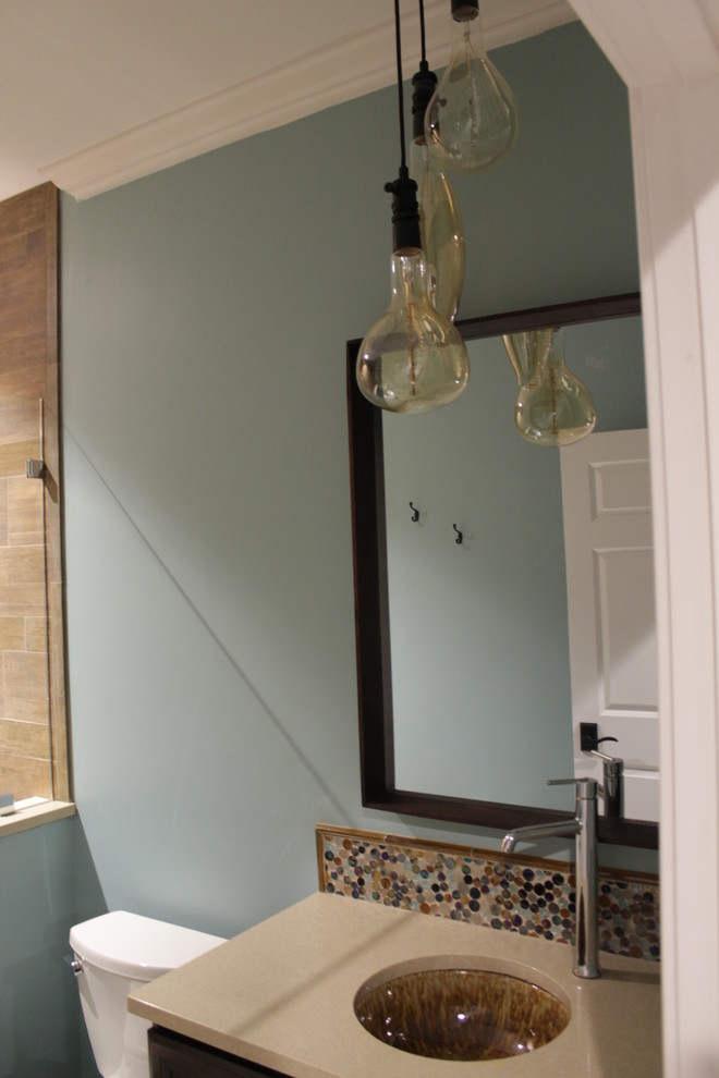 Transitional multicolored tile single-sink bathroom photo in Other with blue walls and beige countertops