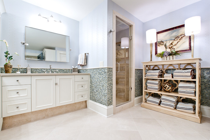 Huge beach style kids' glass tile travertine floor corner shower photo in Atlanta with an undermount sink, raised-panel cabinets, white cabinets, concrete countertops, a two-piece toilet and blue walls