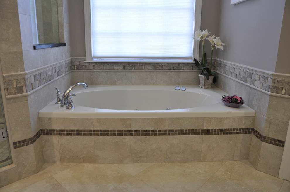 Example of a mid-sized classic master gray tile and porcelain tile porcelain tile bathroom design in Atlanta with raised-panel cabinets, gray cabinets, a two-piece toilet, gray walls, an undermount sink and granite countertops