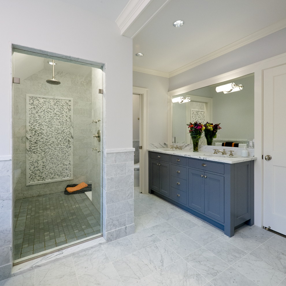 Elegant gray tile gray floor alcove shower photo in Minneapolis with an undermount sink, recessed-panel cabinets and blue cabinets