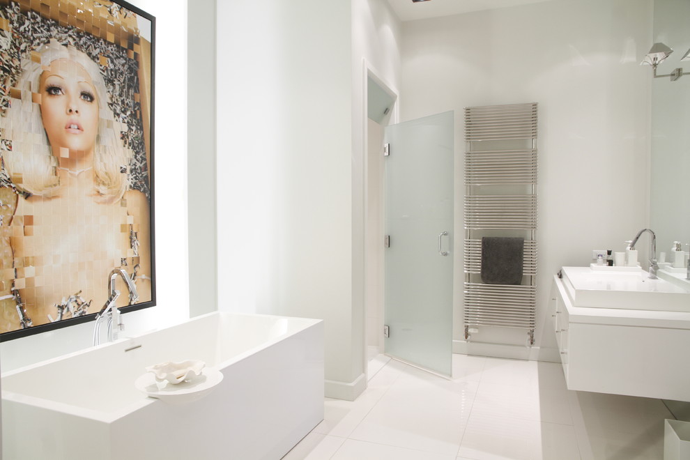 Example of a trendy freestanding bathtub design in Montreal
