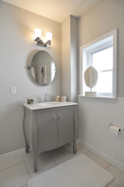 This is an example of a medium sized traditional bathroom in St Louis with flat-panel cabinets, grey cabinets, brown tiles, ceramic tiles, grey walls, ceramic flooring and marble worktops.