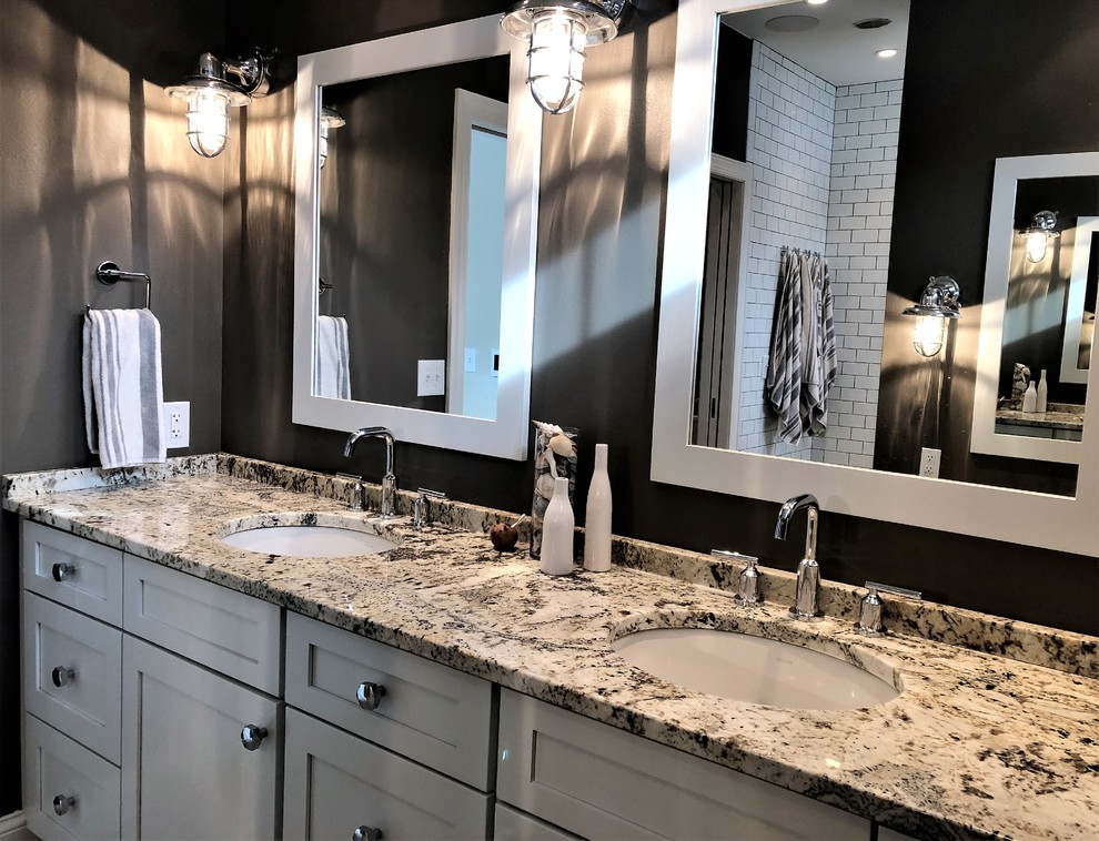 Inspiration for a mid-sized transitional master subway tile painted wood floor doorless shower remodel in Other with shaker cabinets, white cabinets, an undermount sink, granite countertops and multicolored countertops