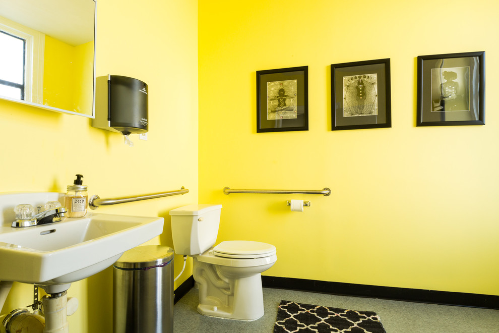 This is an example of a medium sized contemporary shower room bathroom in New York with yellow walls.