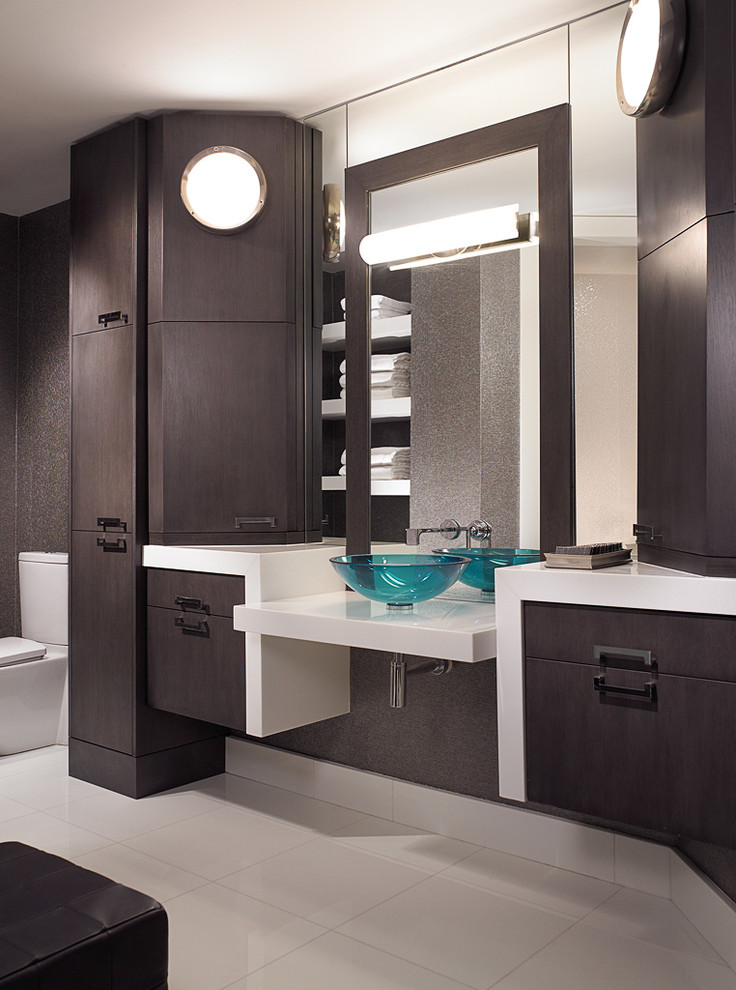 Design ideas for a medium sized contemporary ensuite bathroom in Miami with flat-panel cabinets, dark wood cabinets, a vessel sink and engineered stone worktops.
