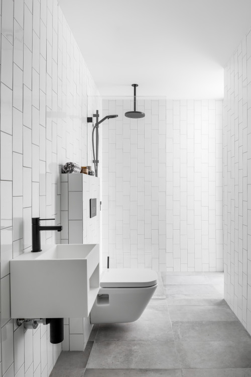 All-White Bathroom Design with Vertical Metro Tiles