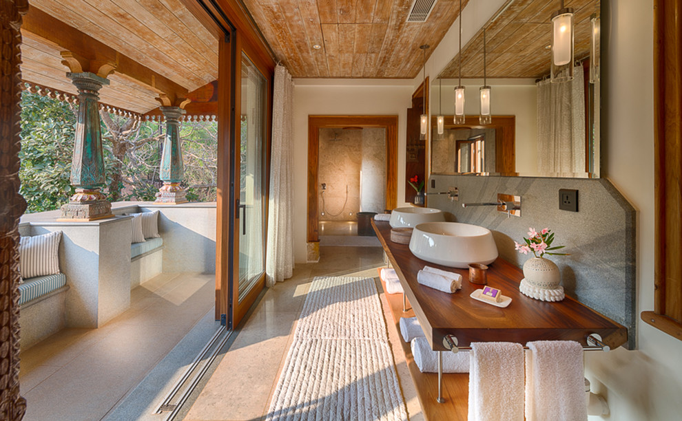 Diseño de cuarto de baño de estilo zen grande sin sin inodoro con paredes azules, suelo azul, ducha abierta y encimeras azules