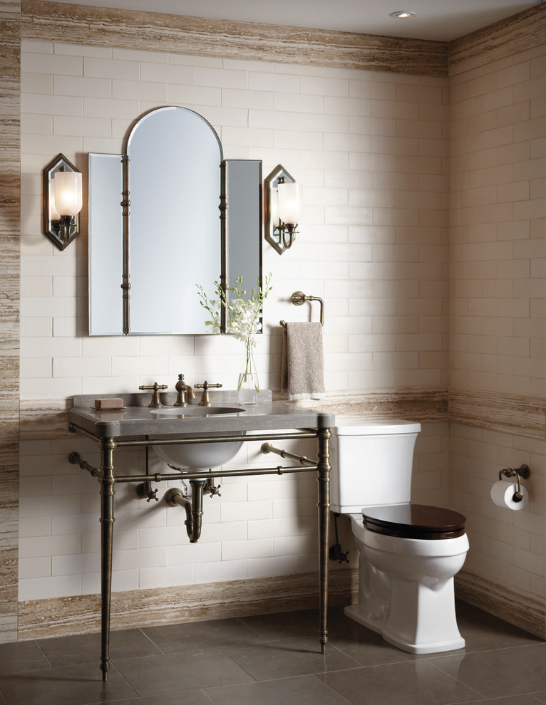Inspiration for an industrial subway tile bathroom remodel in New York with a console sink