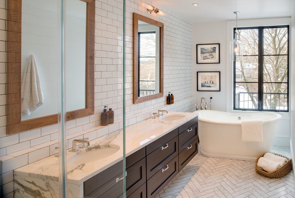Eclectic white tile and porcelain tile marble floor bathroom photo in DC Metro with an undermount sink, shaker cabinets, black cabinets, marble countertops, a one-piece toilet and white walls