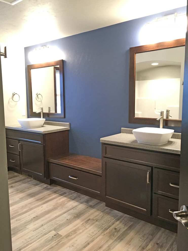 Bathroom - large craftsman master vinyl floor bathroom idea in Other with recessed-panel cabinets, dark wood cabinets, granite countertops, purple walls and a vessel sink