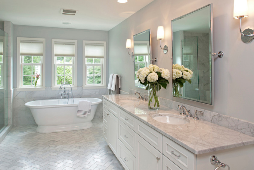 Mid-sized transitional master gray tile and porcelain tile marble floor and gray floor bathroom photo in Kansas City with shaker cabinets, white cabinets, a one-piece toilet, gray walls, an undermount sink, quartz countertops, a hinged shower door and gray countertops