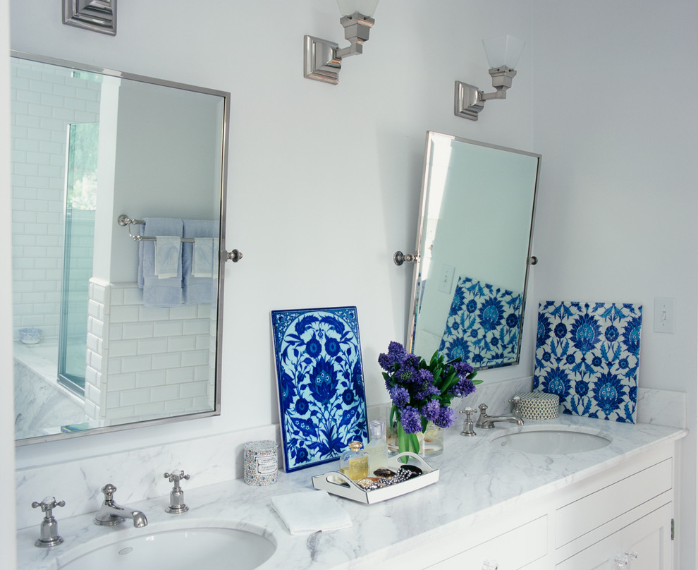 Bathroom - traditional white tile and subway tile bathroom idea in Los Angeles with an undermount sink and white cabinets