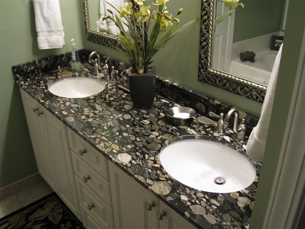 Example of an island style bathroom design in Other