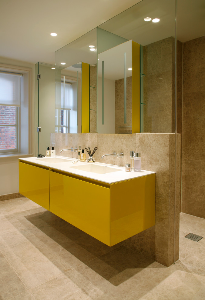 Trendy bathroom photo in London with yellow cabinets