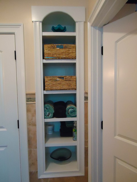 Built-ins Boost Storage in Small Bathrooms