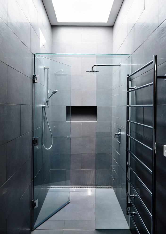 Bathroom - mid-sized modern master gray tile and ceramic tile ceramic tile bathroom idea in Melbourne with a one-piece toilet, gray walls, an undermount sink and a hinged shower door