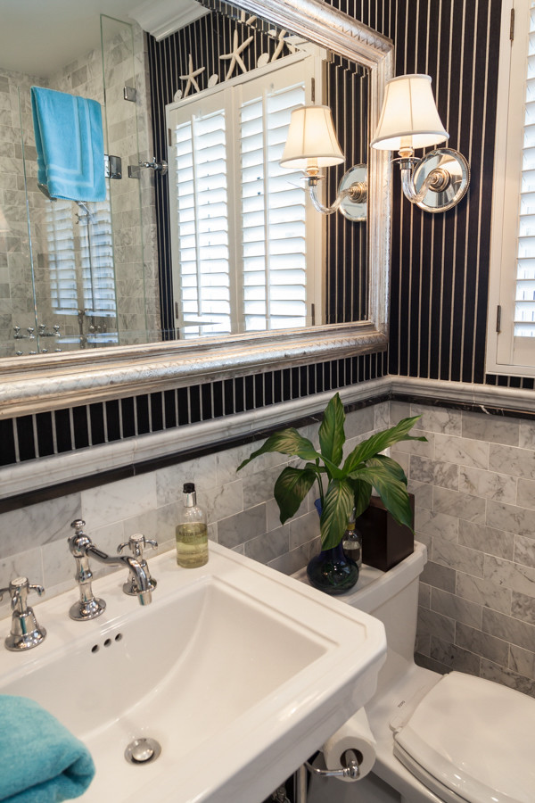 Small classic bathroom in Los Angeles with a pedestal sink, an alcove shower, a one-piece toilet, grey tiles, ceramic tiles, grey walls and ceramic flooring.