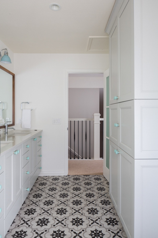 Alcove shower - mid-sized farmhouse kids' multicolored tile and cement tile cement tile floor alcove shower idea in Denver with shaker cabinets, gray cabinets, a two-piece toilet, white walls, an undermount sink and quartz countertops
