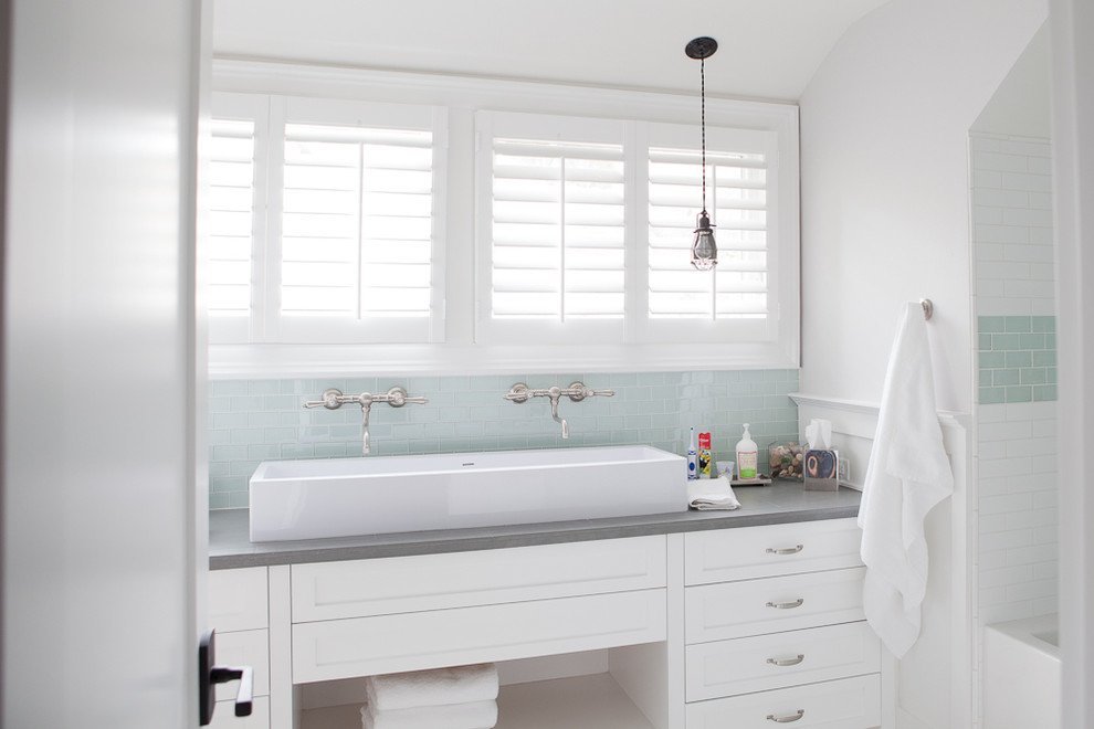 Example of a trendy kids' bathroom design in Portland with a trough sink and gray countertops