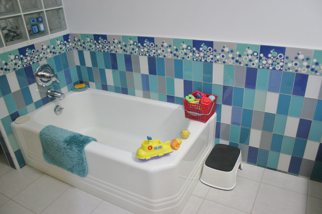 Kids bathroom with a classic tub in a Midcentury modern bathroom in ...