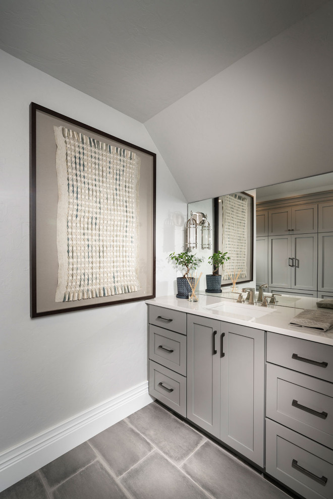 Inspiration for a large modern master gray tile vaulted ceiling, porcelain tile, gray floor and single-sink bathroom remodel in Other with gray walls, gray cabinets, a one-piece toilet, an undermount sink, quartz countertops, a hinged shower door, white countertops and a built-in vanity