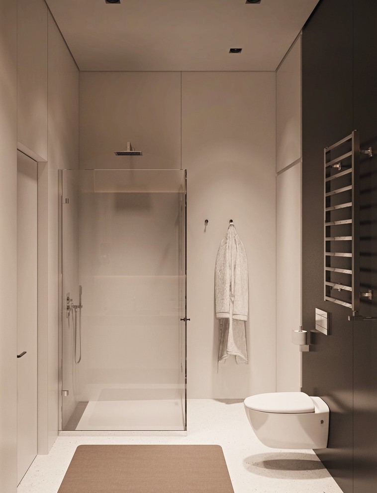 Cette photo montre une salle de bain moderne de taille moyenne avec un placard à porte vitrée, une baignoire d'angle, WC suspendus, un carrelage gris, des carreaux de céramique, un mur gris, un sol en carrelage de céramique, un lavabo intégré, un plan de toilette en béton, un sol gris et une cabine de douche à porte coulissante.