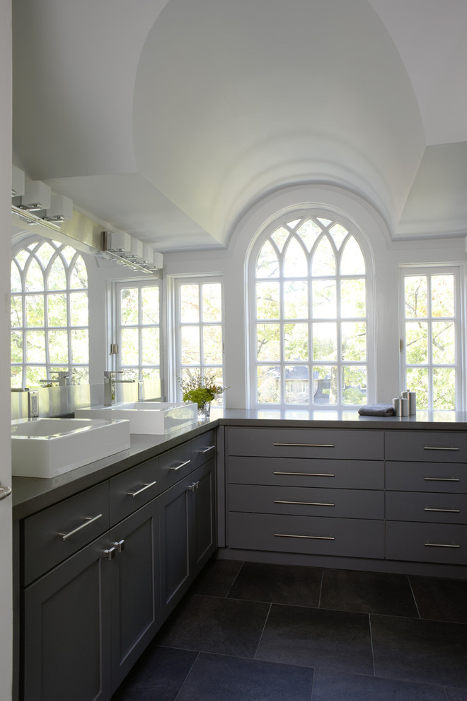 Inspiration for a transitional bathroom remodel in Toronto with a vessel sink, flat-panel cabinets and gray cabinets