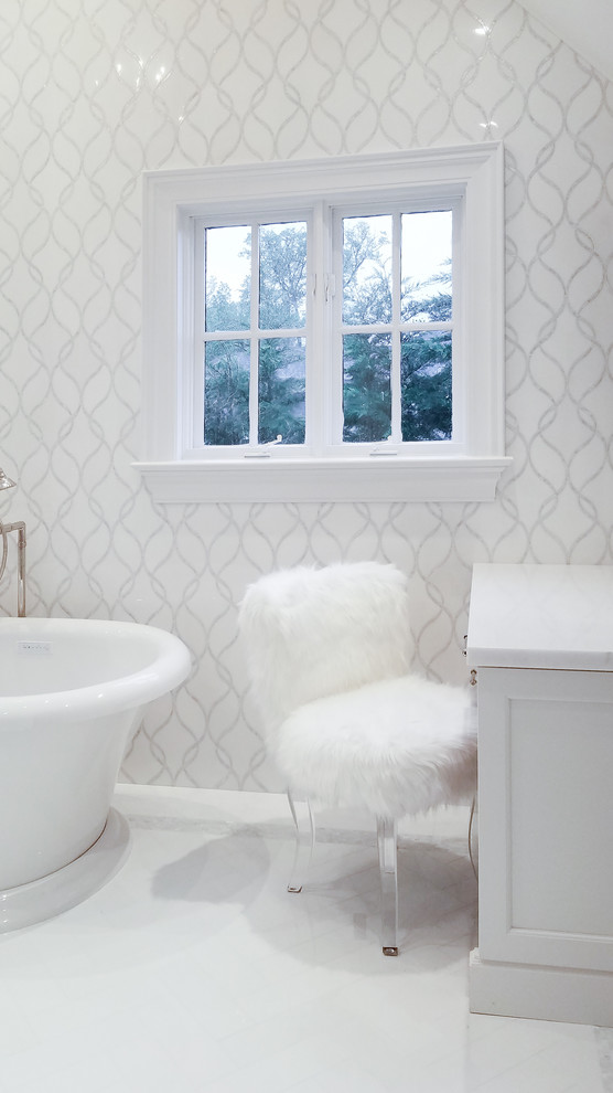 Large classic ensuite bathroom in New York with white tiles and white floors.