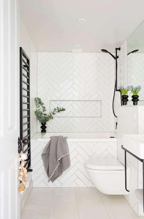 Elevate Your Bathrooms with Captivating Herringbone Layouts and White Shower Tile Ideas