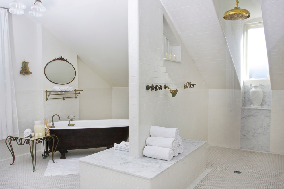 Photo of a contemporary bathroom in New Orleans with a freestanding bath.