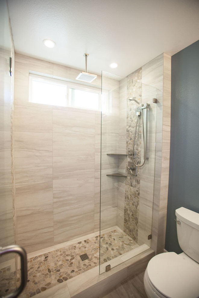 Mid-sized minimalist master light wood floor corner shower photo in Los Angeles with beaded inset cabinets, white cabinets, a one-piece toilet, blue walls and granite countertops