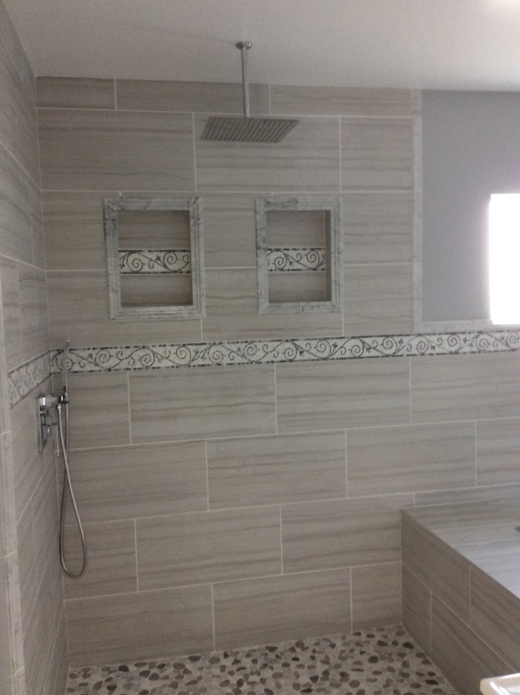Inspiration for a medium sized traditional ensuite bathroom in Phoenix with recessed-panel cabinets, dark wood cabinets, a walk-in shower, grey tiles, cement tiles, beige walls, pebble tile flooring, engineered stone worktops, grey floors and an open shower.