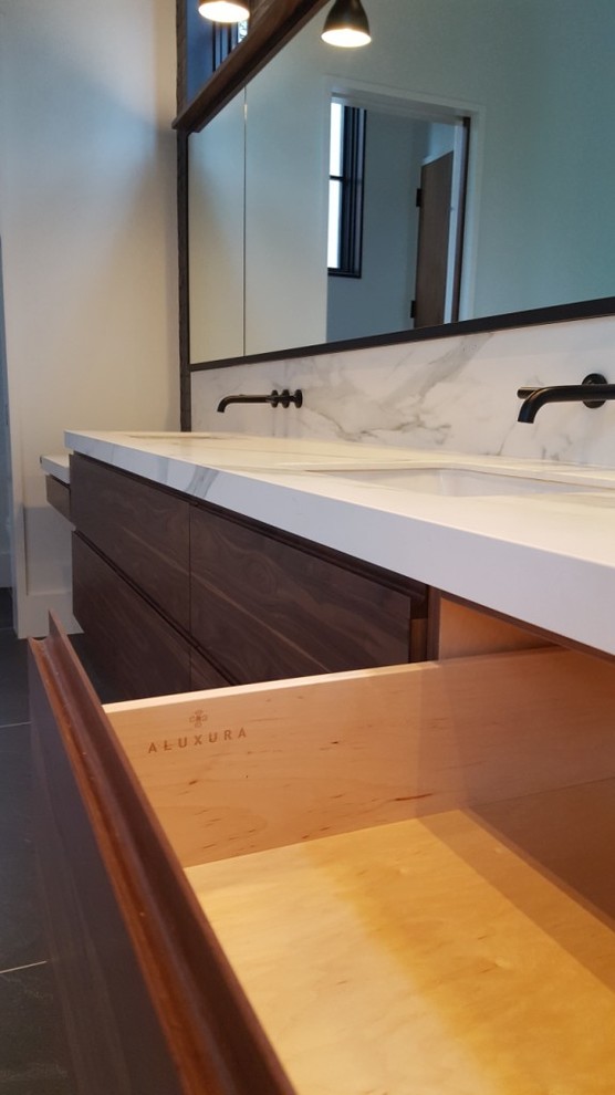 Photo of a modern ensuite bathroom in Other with flat-panel cabinets and medium wood cabinets.