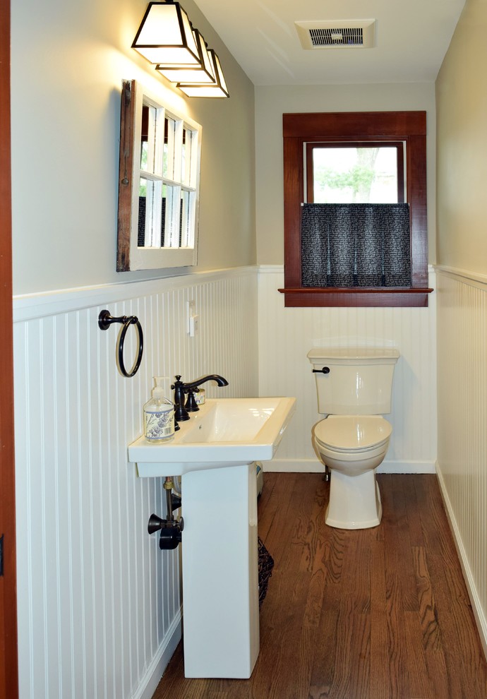 Photo of a medium sized classic shower room bathroom in Philadelphia with medium hardwood flooring, a pedestal sink, brown floors, a one-piece toilet and green tiles.