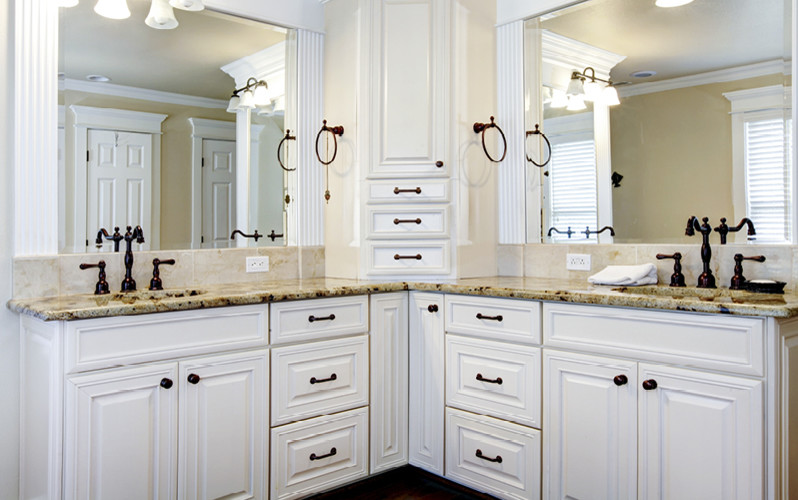 Mid-sized elegant master bathroom photo in Albuquerque with raised-panel cabinets, white cabinets, white walls, an undermount sink and granite countertops
