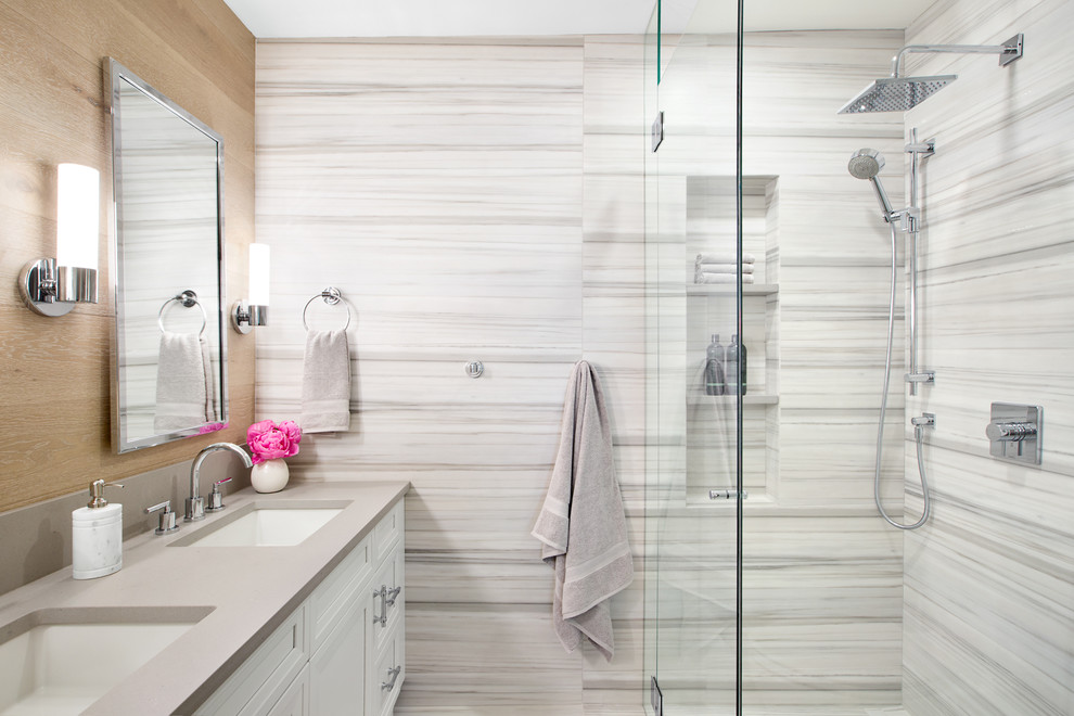 Inspiration for a small traditional ensuite bathroom in Vancouver with raised-panel cabinets, white cabinets, a built-in shower, a one-piece toilet, grey tiles, porcelain tiles, grey walls, porcelain flooring, a submerged sink, engineered stone worktops, grey floors and a hinged door.