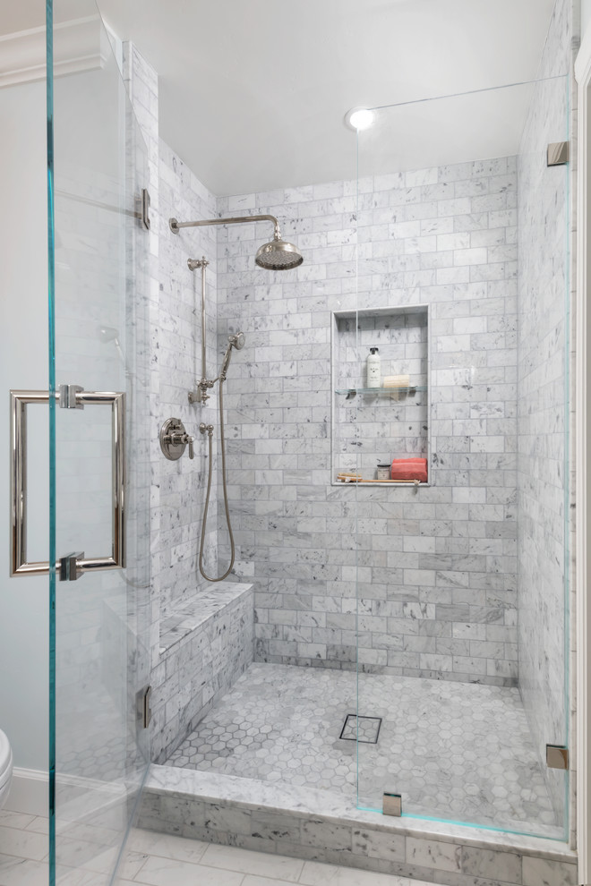 Large traditional shower room bathroom in San Francisco with beaded cabinets, light wood cabinets, an alcove shower, a one-piece toilet, grey tiles, marble tiles, blue walls, porcelain flooring, a submerged sink, engineered stone worktops, grey floors, a hinged door and white worktops.