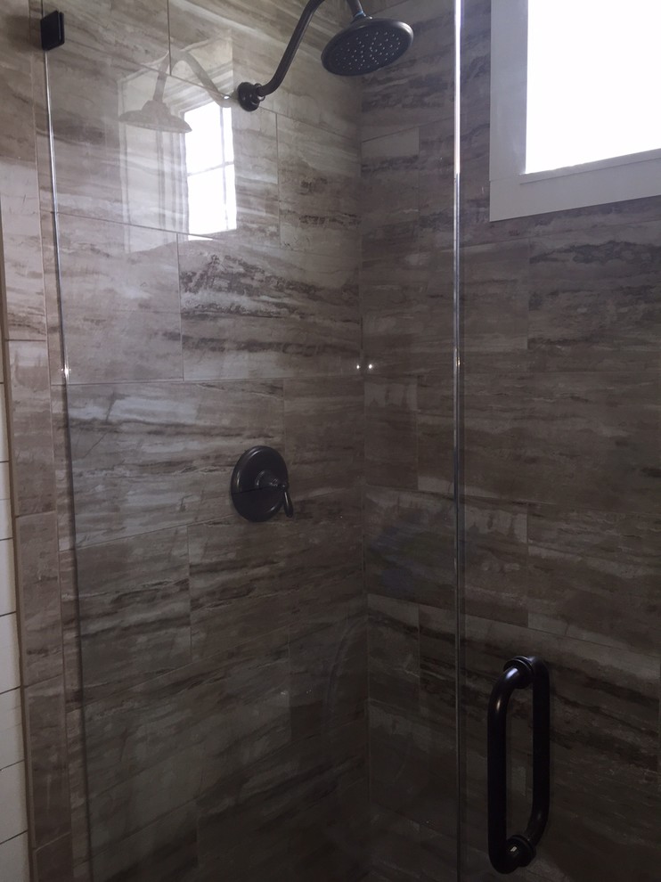 Mid-sized arts and crafts 3/4 beige tile and porcelain tile porcelain tile alcove shower photo in Atlanta with shaker cabinets, gray cabinets, a two-piece toilet, beige walls, an undermount sink and granite countertops