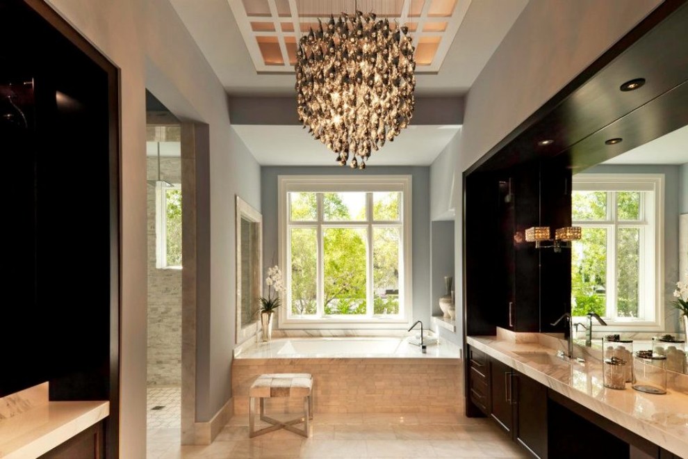 This is an example of a contemporary ensuite bathroom in Denver with shaker cabinets, dark wood cabinets, an alcove bath, a walk-in shower, white tiles, metro tiles, grey walls, a submerged sink and marble worktops.