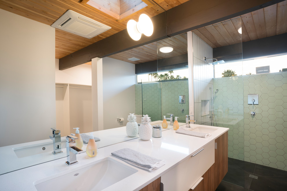 Midcentury bathroom in Los Angeles with a corner shower.