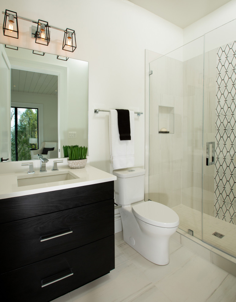 Photo of a classic bathroom in DC Metro with engineered stone worktops, white worktops and a single sink.