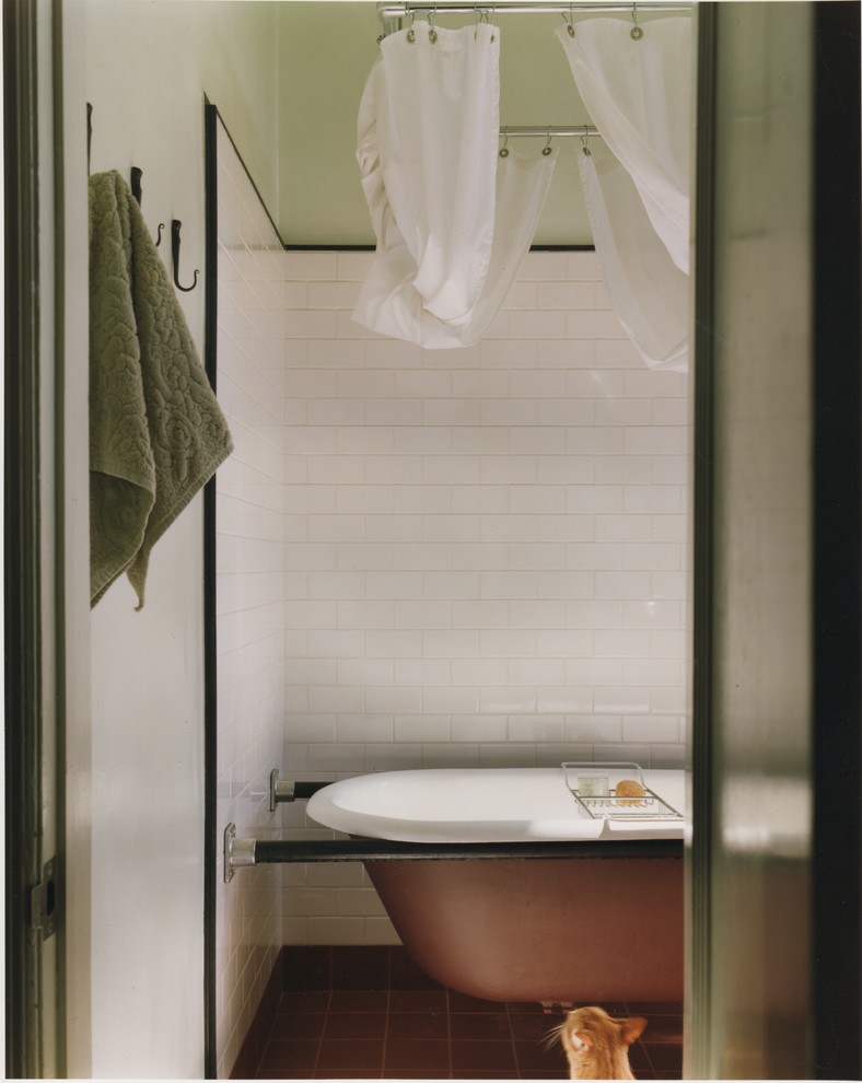Mid-sized urban white tile and subway tile ceramic tile claw-foot bathtub photo in New York with green walls