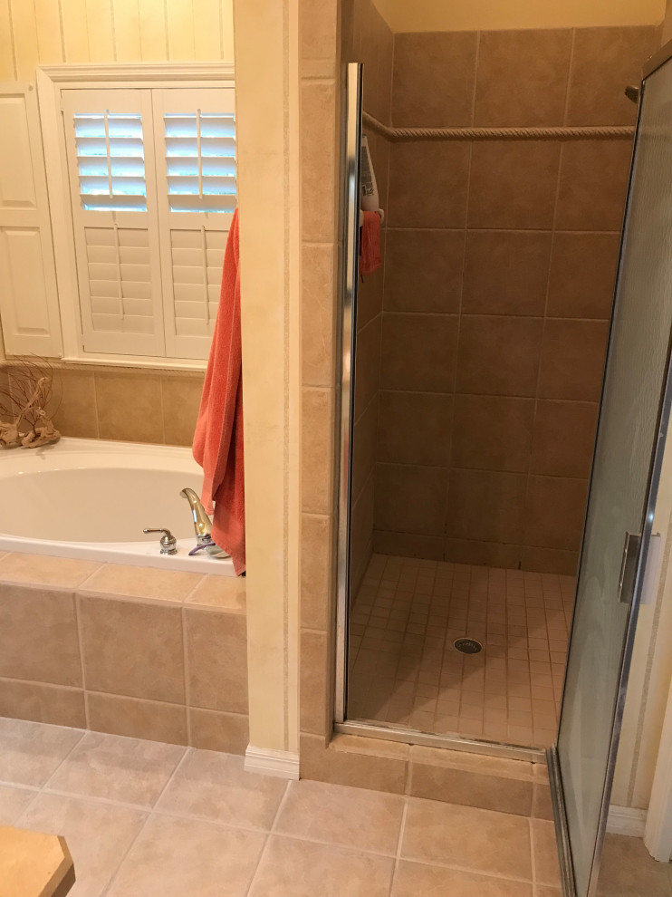 Inspiration for a large modern master gray tile and porcelain tile porcelain tile and gray floor double shower remodel in Jacksonville with shaker cabinets and a hinged shower door