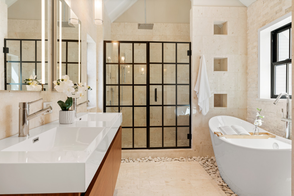 Idée de décoration pour une salle de bain principale minimaliste avec un placard à porte plane, une baignoire indépendante, un espace douche bain, un carrelage beige, un sol en galet, un lavabo intégré, une cabine de douche à porte battante, un plan de toilette blanc, une niche, meuble double vasque, meuble-lavabo suspendu et un plafond voûté.
