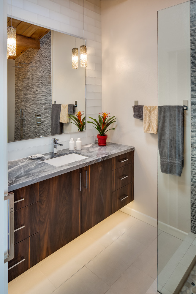 Small trendy master white tile and subway tile travertine floor bathroom photo in San Diego with an undermount sink, flat-panel cabinets, dark wood cabinets, marble countertops, white walls and gray countertops