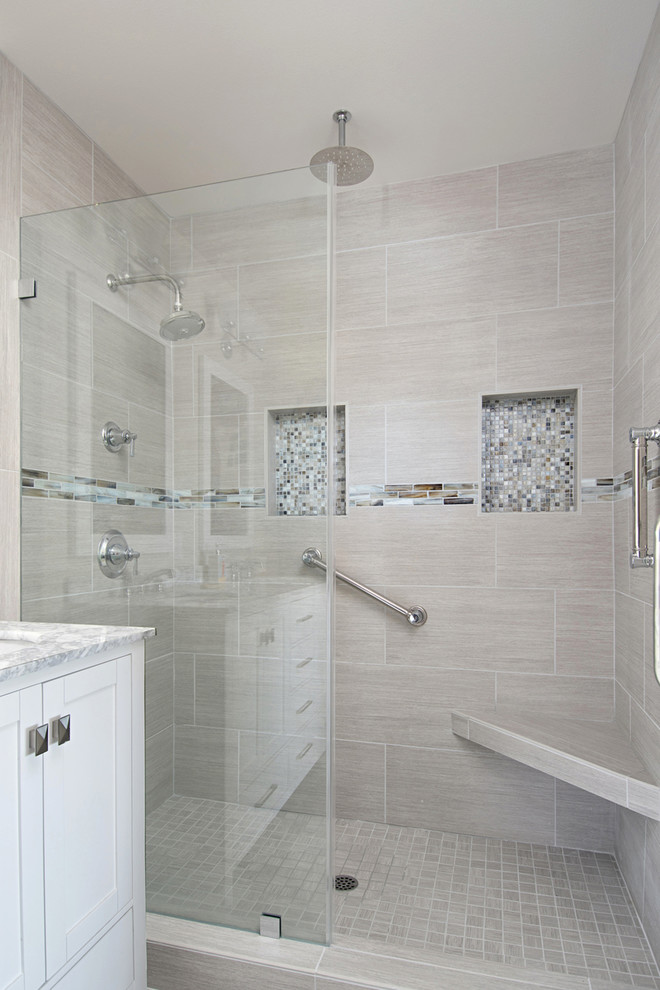 Example of a small beach style master gray tile and porcelain tile porcelain tile and gray floor bathroom design in San Diego with recessed-panel cabinets, white cabinets, a two-piece toilet, gray walls, an undermount sink and quartzite countertops