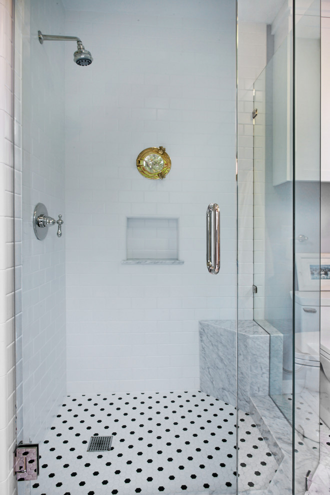 This is an example of a medium sized classic shower room bathroom in Orange County with shaker cabinets, white cabinets, a built-in sink, a double shower, grey tiles, yellow walls and mosaic tile flooring.
