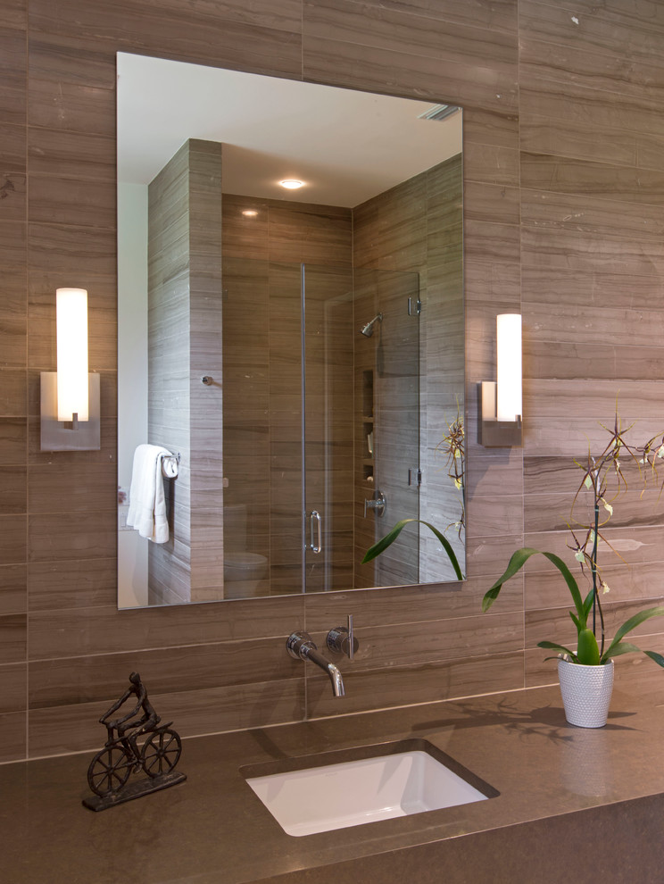 Inspiration for a large contemporary master brown tile and porcelain tile limestone floor walk-in shower remodel in Austin with an undermount sink, quartz countertops and yellow walls